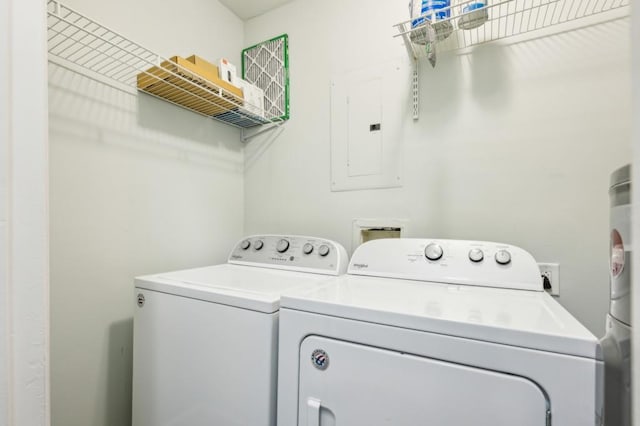 washroom with laundry area, electric panel, and independent washer and dryer