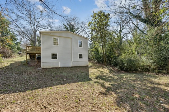 exterior space featuring a wooden deck