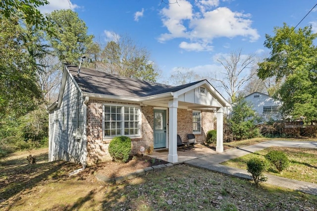 view of front of house with brick siding