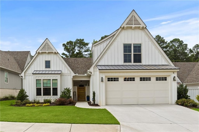 modern inspired farmhouse featuring driveway, roof with shingles, a standing seam roof, a front lawn, and board and batten siding