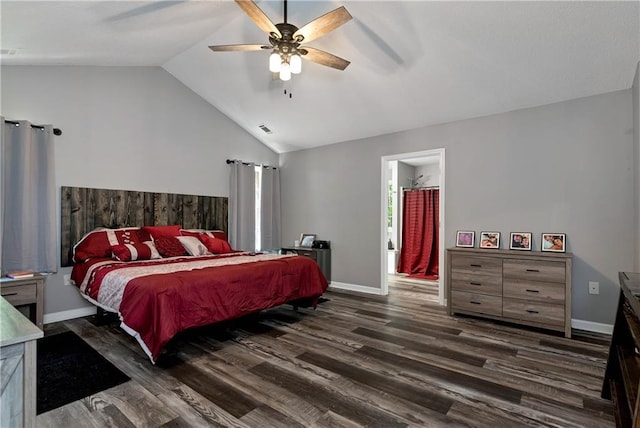 bedroom with visible vents, baseboards, lofted ceiling, and wood finished floors