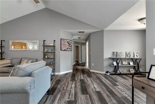 living room with visible vents, baseboards, wood finished floors, and vaulted ceiling