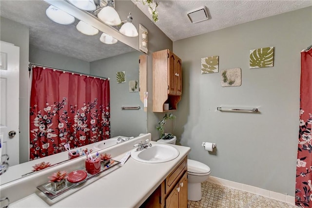 carpeted bedroom with ceiling fan and a textured ceiling