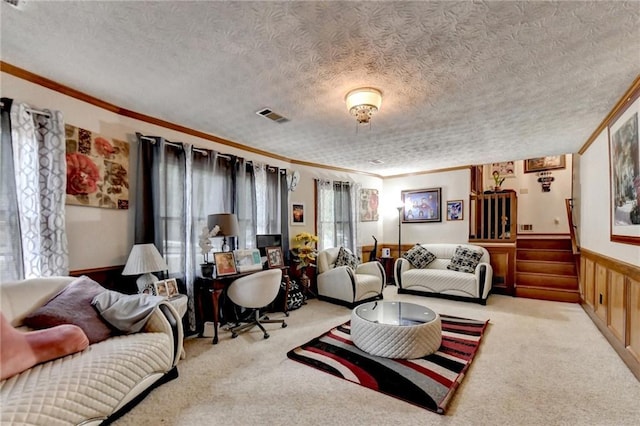 bedroom featuring ceiling fan, light carpet, and a textured ceiling