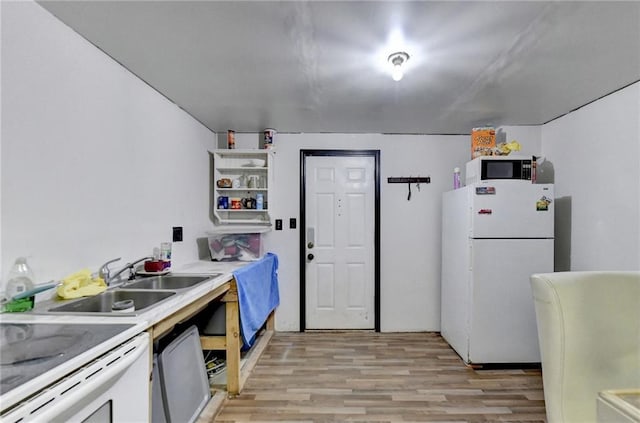 interior space with light hardwood / wood-style flooring and a paneled ceiling