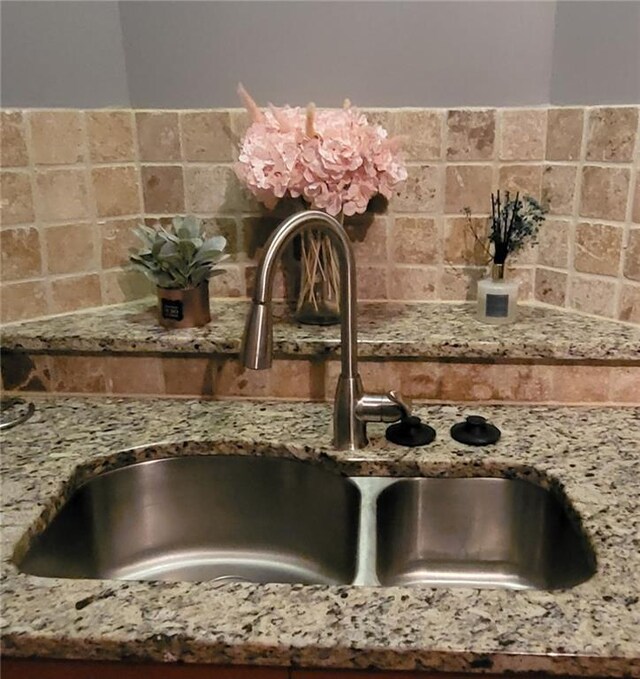 interior details with stone counters and sink