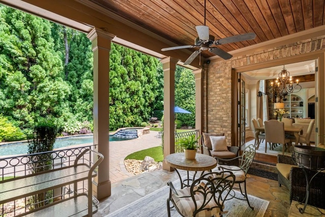 view of patio featuring ceiling fan