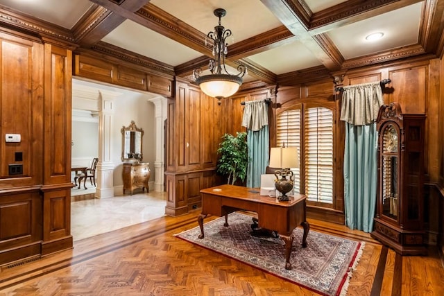 office space featuring coffered ceiling, wooden walls, ornamental molding, beam ceiling, and decorative columns