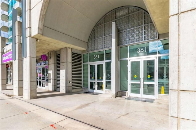 entrance to property featuring french doors