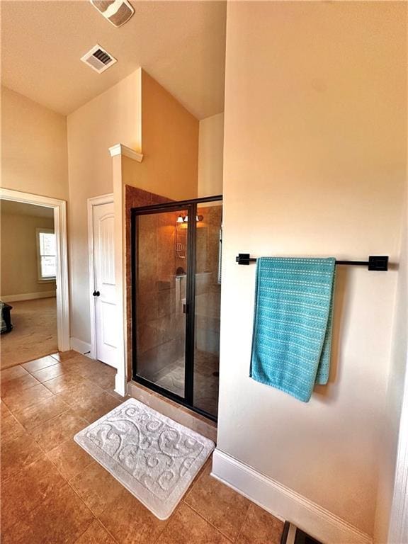 520 Harmony Way, Locust Grove, GA 30248 - bathroom featuring baseboards, a shower stall, and tile patterned flooring