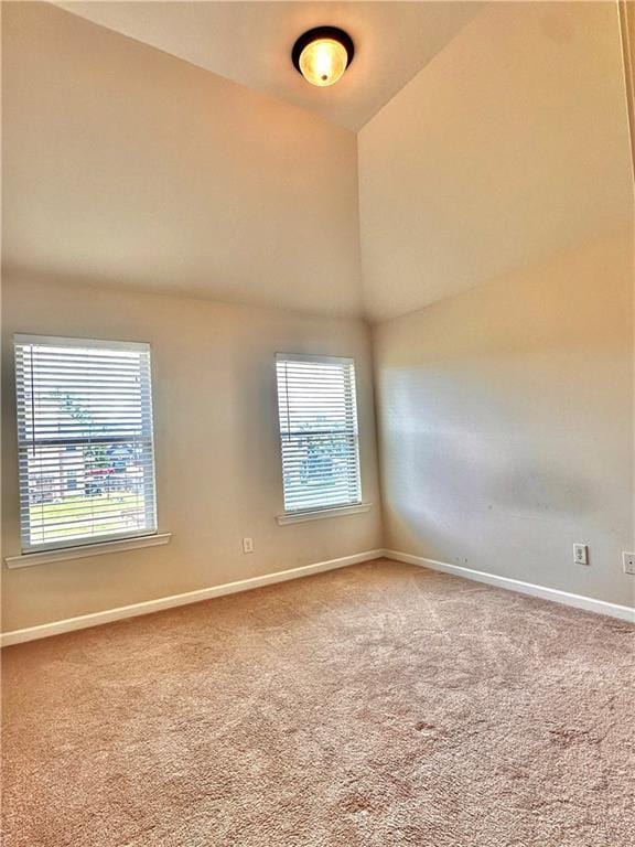 520 Harmony Way, Locust Grove, GA 30248 - unfurnished room with baseboards, carpet flooring, and high vaulted ceiling