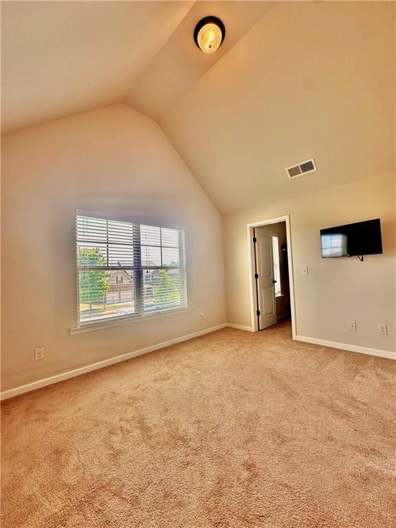 520 Harmony Way, Locust Grove, GA 30248 - unfurnished room featuring lofted ceiling, light colored carpet, and baseboards