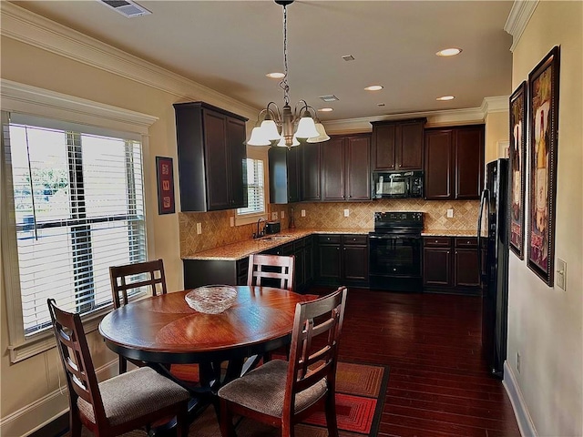 520 Harmony Way, Locust Grove, GA 30248 - kitchen with black appliances, a sink, a chandelier, tasteful backsplash, and dark wood-type flooring