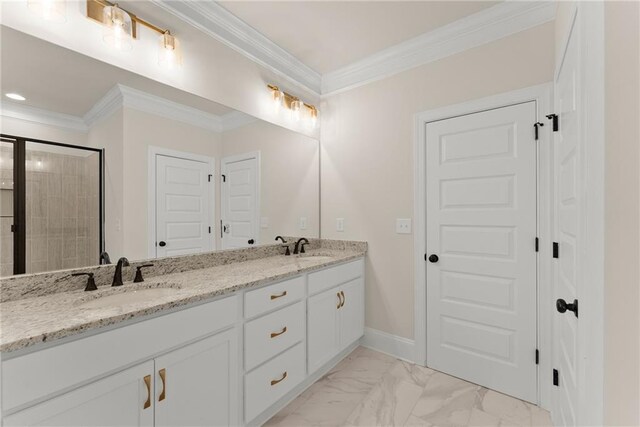 bathroom with crown molding, tiled shower, and vanity