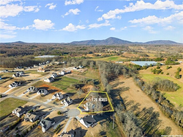 drone / aerial view featuring a mountain view