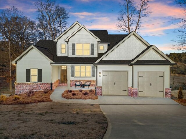 craftsman-style house featuring a garage