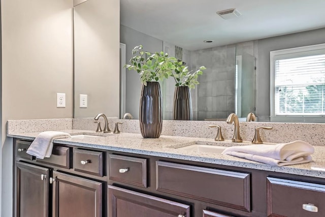 11760 Stratham Dr, Alpharetta, GA 30009 - bathroom with double vanity and tiled shower