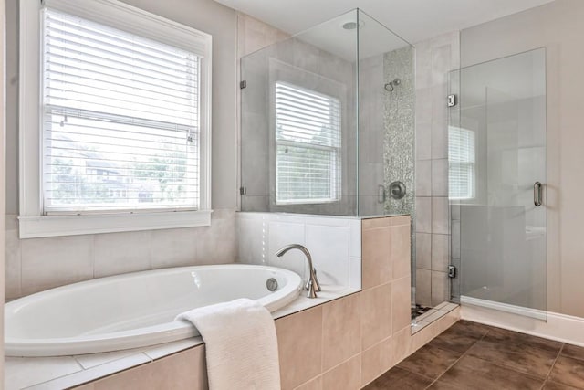 11760 Stratham Dr, Alpharetta, GA 30009 - bathroom with a shower stall, a bath, and tile patterned floors