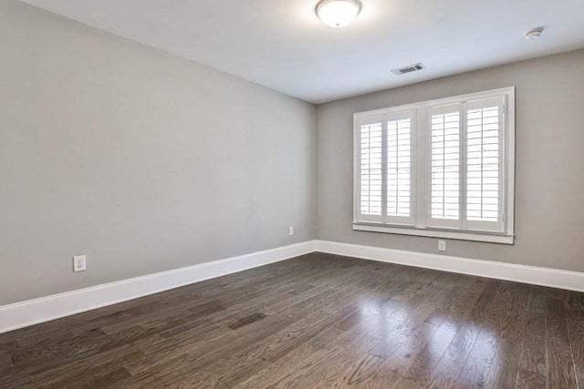 11760 Stratham Dr, Alpharetta, GA 30009 - spare room featuring a smoke detector and dark wood finished floors