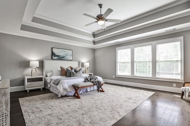 11760 Stratham Dr, Alpharetta, GA 30009 - bedroom featuring a raised ceiling, ornamental molding, dark wood-style floors, and ceiling fan