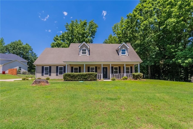 1406 Windy Ridge Ct SE, Conyers, GA 30013 - cape cod-style house featuring covered porch and a chimney