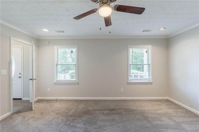 1406 Windy Ridge Ct SE, Conyers, GA 30013 - unfurnished room featuring plenty of natural light, carpet floors, a textured ceiling, crown molding, and a ceiling fan