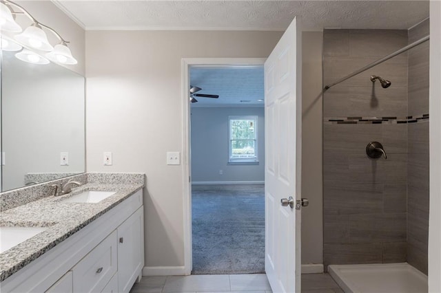 1406 Windy Ridge Ct SE, Conyers, GA 30013 - full bathroom with tiled shower, baseboards, double vanity, tile patterned flooring, and a ceiling fan