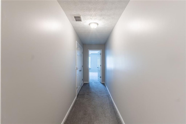 1406 Windy Ridge Ct SE, Conyers, GA 30013 - hall with carpet flooring, baseboards, and a textured ceiling