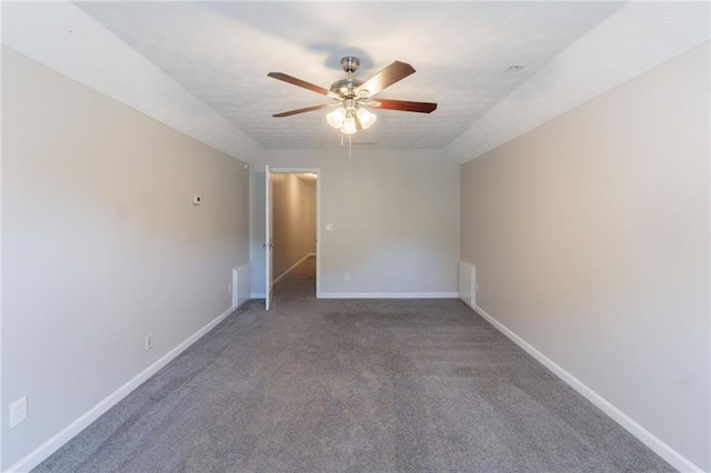 1406 Windy Ridge Ct SE, Conyers, GA 30013 - carpeted spare room featuring ceiling fan, baseboards, and vaulted ceiling