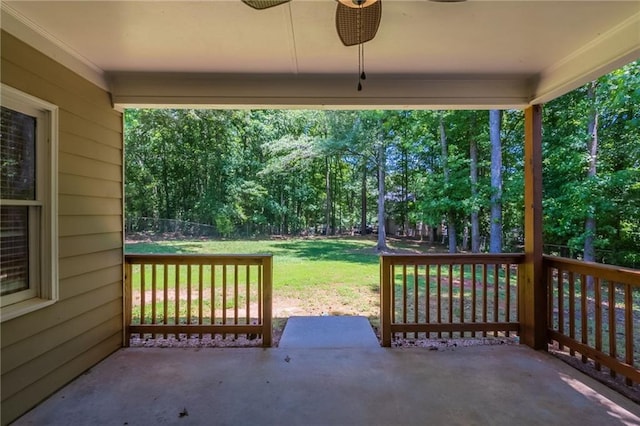 1406 Windy Ridge Ct SE, Conyers, GA 30013 - view of patio / terrace featuring ceiling fan and view of scattered trees