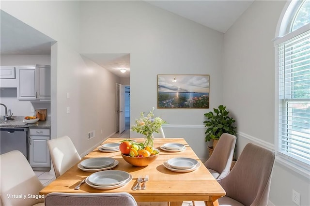 1406 Windy Ridge Ct SE, Conyers, GA 30013 - dining area with lofted ceiling and plenty of natural light