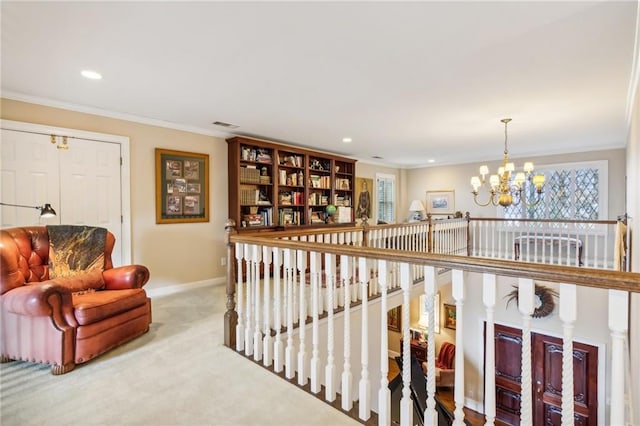 hallway featuring baseboards, light colored carpet, an inviting chandelier, crown molding, and recessed lighting