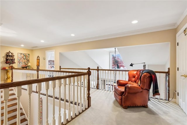 living area with recessed lighting, light carpet, and crown molding