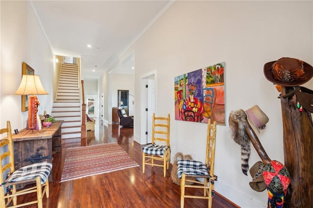 corridor with recessed lighting, visible vents, wood finished floors, baseboards, and stairs