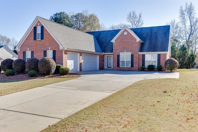 view of property featuring a front lawn