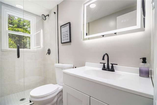 479 Charter Oak Dr SW, Atlanta, GA 30331 - bathroom featuring a stall shower, toilet, and vanity