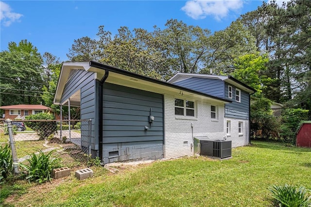 479 Charter Oak Dr SW, Atlanta, GA 30331 - back of property featuring central AC and crawl space
