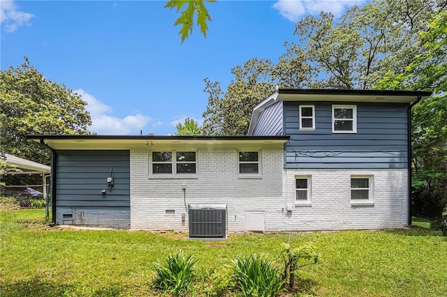 479 Charter Oak Dr SW, Atlanta, GA 30331 - rear view of property featuring cooling unit, brick siding, and crawl space