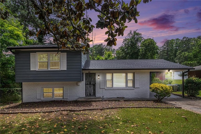 479 Charter Oak Dr SW, Atlanta, GA 30331 - split level home featuring a yard and brick siding