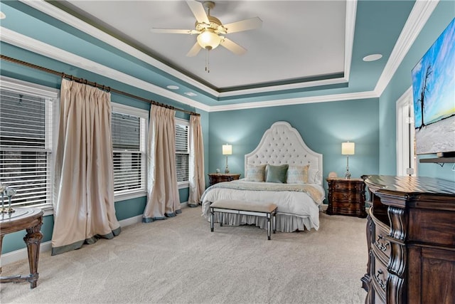 3663 Brookhaven Manor Xing NE, Atlanta, GA 30319 - carpeted bedroom featuring a tray ceiling, crown molding, baseboards, and a ceiling fan