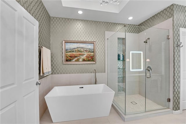 3663 Brookhaven Manor Xing NE, Atlanta, GA 30319 - full bathroom with wallpapered walls, a soaking tub, recessed lighting, a shower stall, and tile patterned flooring