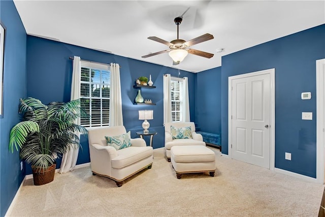 3663 Brookhaven Manor Xing NE, Atlanta, GA 30319 - sitting room featuring carpet, baseboards, and ceiling fan