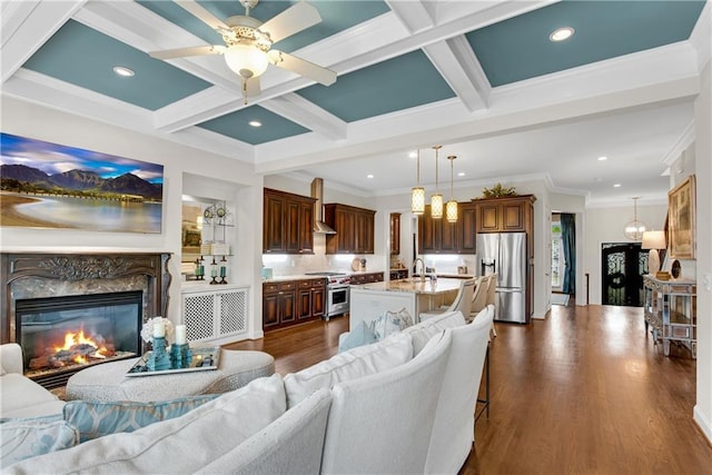 3663 Brookhaven Manor Xing NE, Atlanta, GA 30319 - living area featuring beam ceiling, dark wood-style floors, a fireplace, recessed lighting, and coffered ceiling