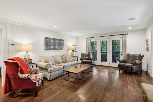 living room featuring recessed lighting, ornamental molding, and hardwood / wood-style floors