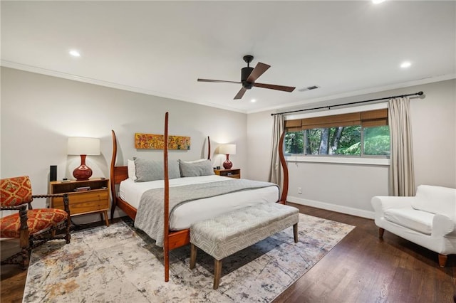bedroom featuring crown molding, baseboards, recessed lighting, and wood finished floors