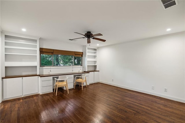 office with visible vents, baseboards, ceiling fan, and wood finished floors