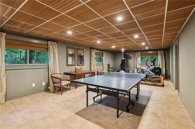 rec room featuring plenty of natural light, recessed lighting, and light tile patterned flooring