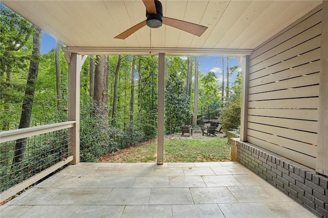 view of patio / terrace featuring ceiling fan