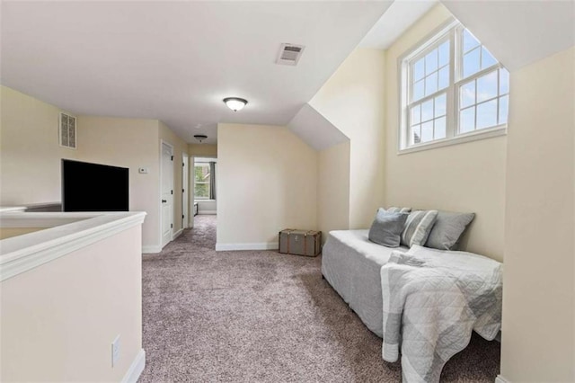 sitting room featuring carpet flooring and baseboards