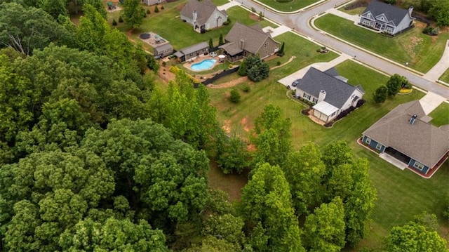 aerial overview of property's location with nearby suburban area